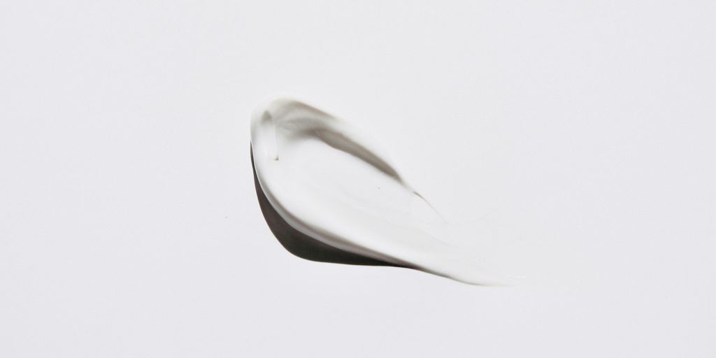 stainless steel spoon on white surface